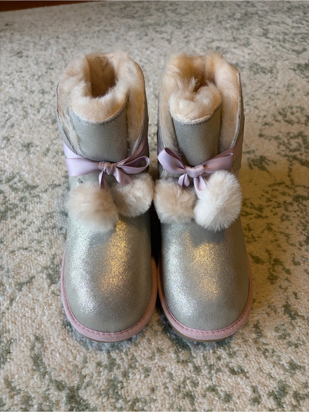 UGG Girls Glitter Silver Pom-Pom Shearling Boots with Purple Trim